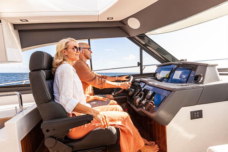 The helm of the 4600 Sport Yacht Platinum Edition features twin leather and Alcantara sports seats photo copyright Riviera Australia taken at  and featuring the Power boat class