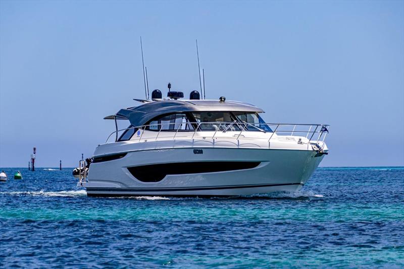 During a quiet mid-week in January, David, Ann, and Ryan cruised over and moored in Thomson Bay - photo © Riviera Australia
