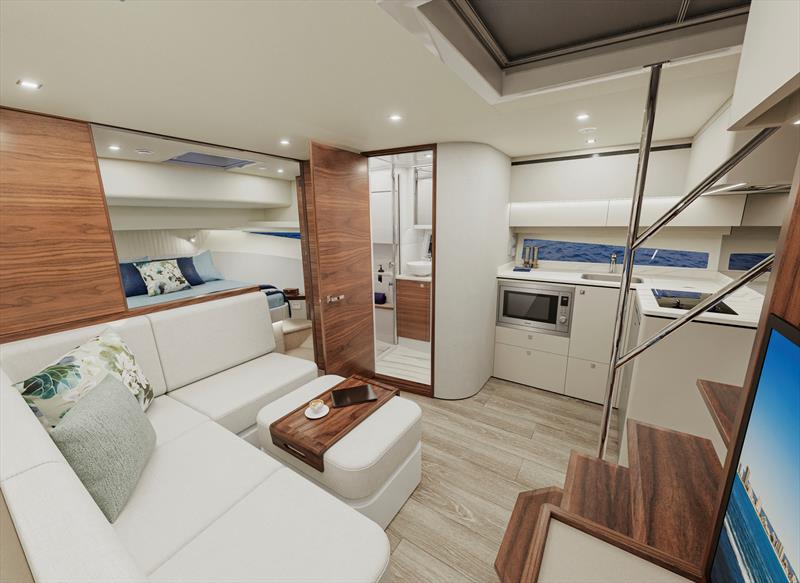 Living and accommodation deck – looking across the lounge to the main galley, bathroom and master stateroom - photo © Riviera Australia