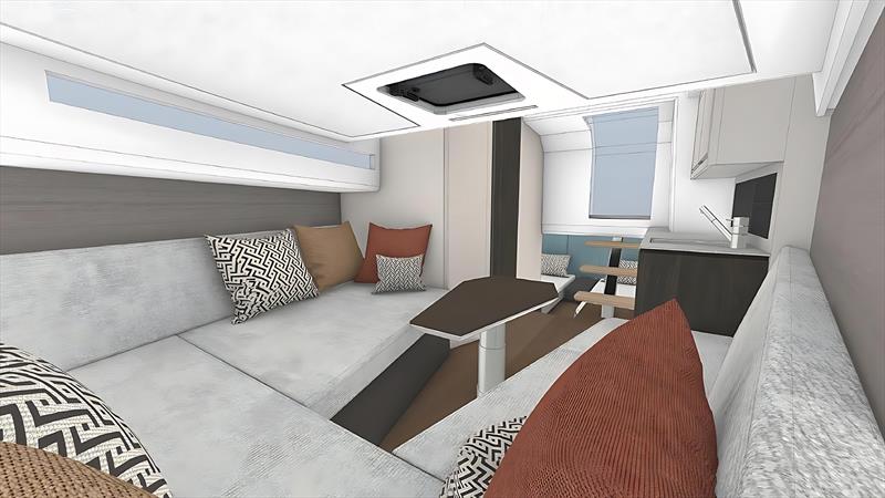 A versatile saloon converts seamlessly from a social dining area into a spacious double bed - photo © Carbon Yachts