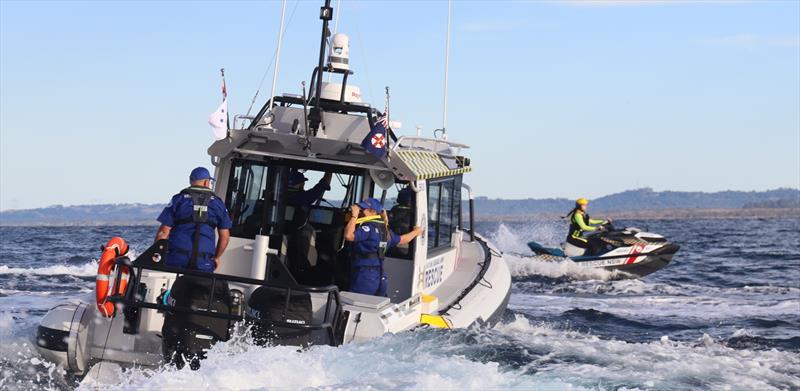 A Marine Rescue NSW vessel and rescue watercraft operator respond to a boater in distress off Brunswick Heads - photo © Marine Rescue NSW 