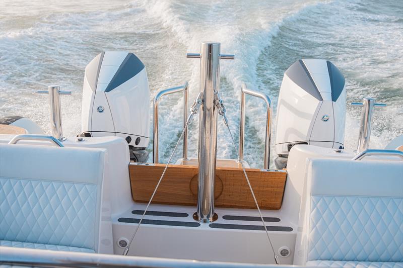 Wrapped Twin Mercury 450 HP Outboards - photo © Protector