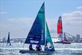 Young sailors take part in the Inspire RS Sailing program look on as Denmark SailGP Team presented by ROCKWOOL helmed by Nicolai Sehested sails past on Australia Sail Grand Prix presented by KPMG Race Day 1 © Phil Hilyard for SailGP