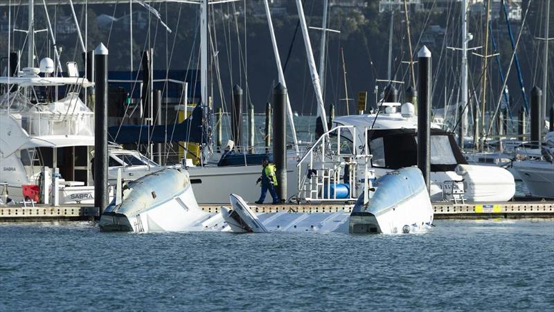 The 50ft cruising catamaran was picked up on one side of the marina, blown across the Pier and dumped upside down on the other side - photo © Chris McKeen/Stuff