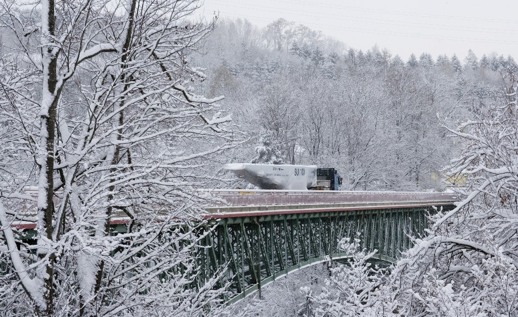 Alinghi SUI-100 leaves snowy Switzerland  en route to Valencia photo copyright Ivo Rovira /Alinghi taken at  and featuring the  class