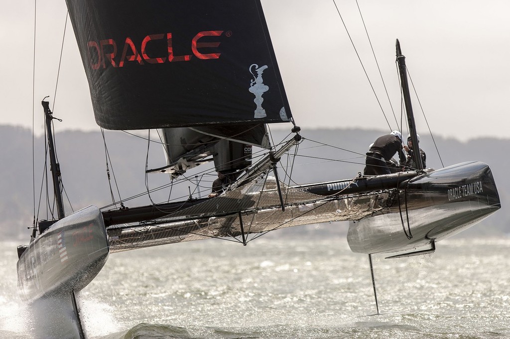 Oracle Team USA on its development AC45 shows a hoisted L-dagger board, to windward, with the leeward hull fully supported and flying, while trialing in San Francisco on the AC45’s.  &copy; Guilain Grenier Oracle Team USA http://www.oracleteamusamedia.com/