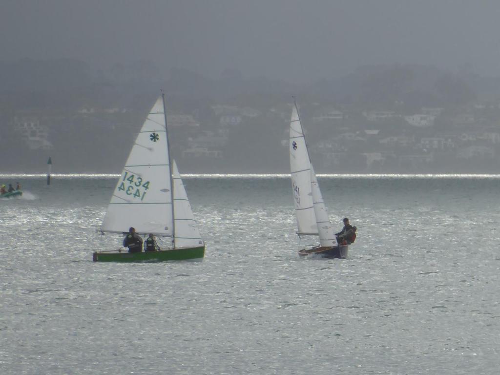 Upwind duel between the 1st and 2nd placegetters. #1434 is 