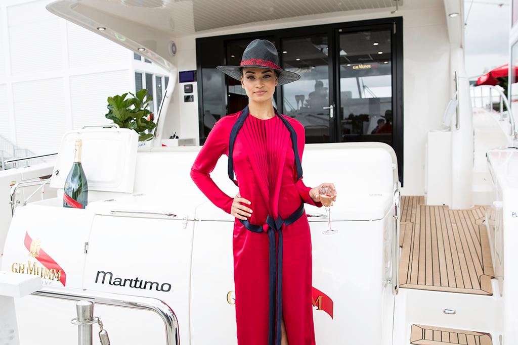 Mumm Champagne Ambassador Shanina Shaik inspecting the Maritimo S59 © Promedia