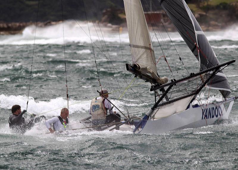 Riding a wild boat in 50-knots during the 2020-21 season photo copyright Frank Quealey taken at Australian 18 Footers League and featuring the 18ft Skiff class