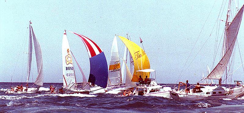 Tia Maria and Chesty Bond and the spectator fleet as the skiffs come through the Heads to Sydney Harbour - The Ocean Challenge photo copyright Frank Quealey taken at Australian 18 Footers League and featuring the 18ft Skiff class