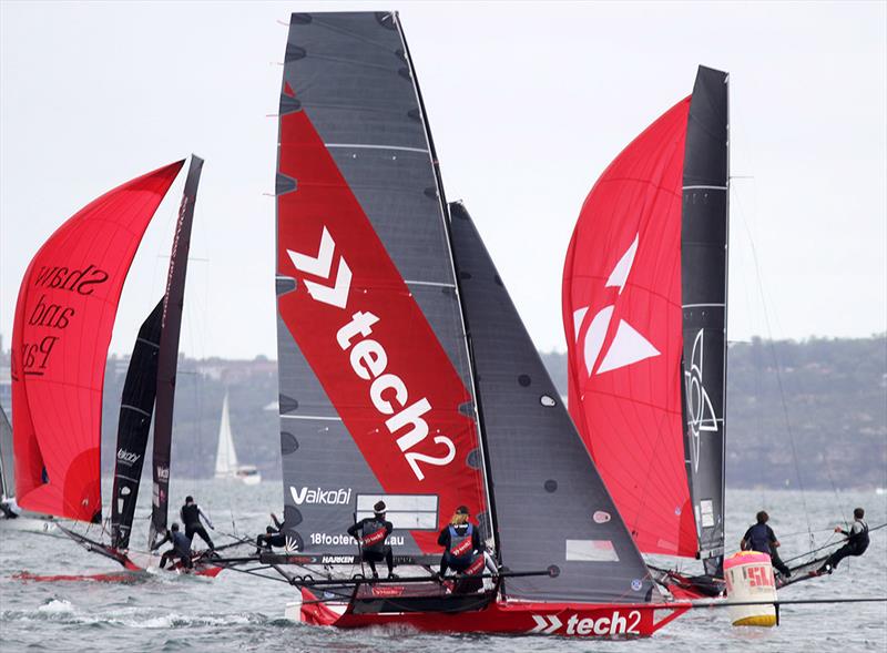 Shaw and Partners takes off under spinnaher as Noakesailing prepare to chase her to Chowder Bay - 18ft Skiff NSW Championship on Sydney Harbour - Race 3 photo copyright Frank Quealey taken at Australian 18 Footers League and featuring the 18ft Skiff class