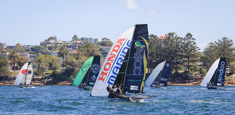 Yandoo leads the fleet along Shark Island during the final race of the 18ft Skiff Winnings 2024 JJ Giltinan Championship photo copyright SailMedia taken at Australian 18 Footers League and featuring the 18ft Skiff class