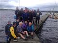 Competitors on the pontoon during the Scottish Team Racing at Cumbernauld SC © David Peace