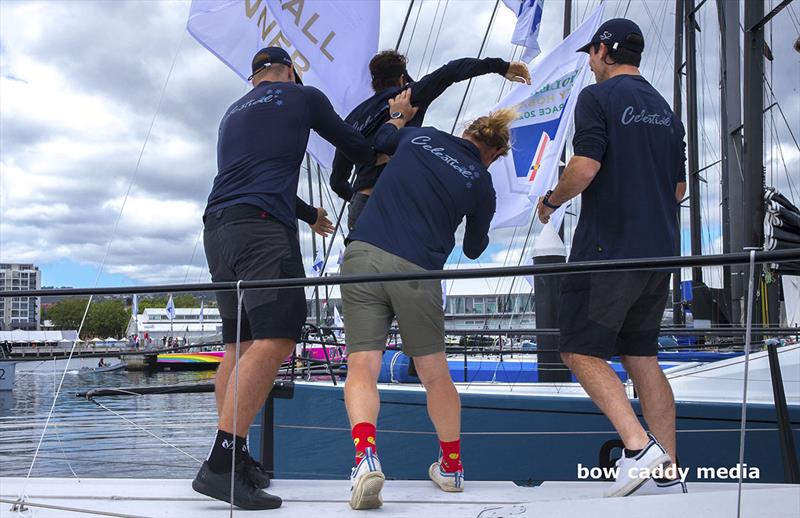 That'd be Jack Macartney getting assisted to step off - photo © Bow Caddy Media