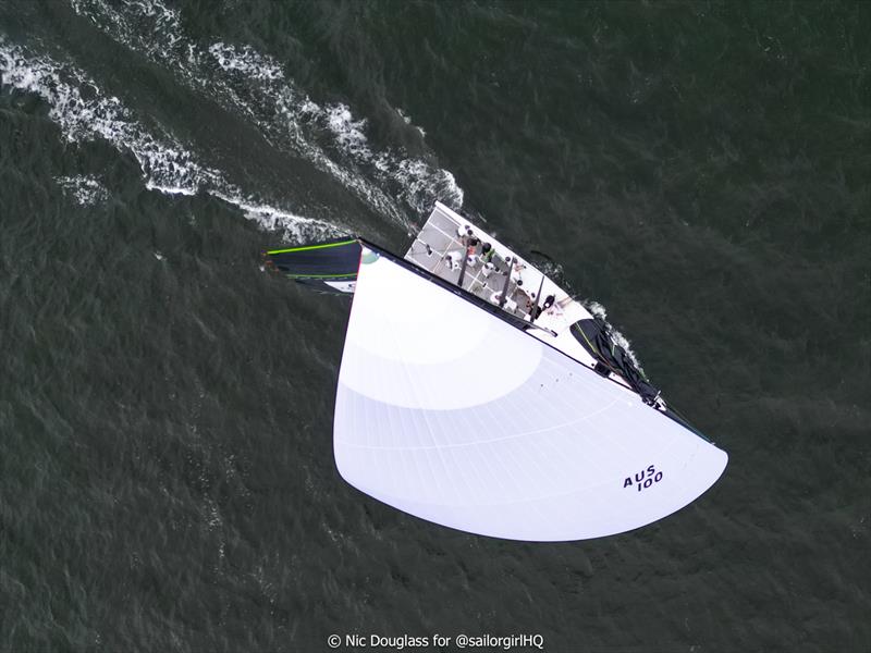 Hooligan scooting with Katie Spithill on the helm photo copyright Nic Douglass for @sailorgirlhq taken at Cruising Yacht Club of Australia and featuring the TP52 class