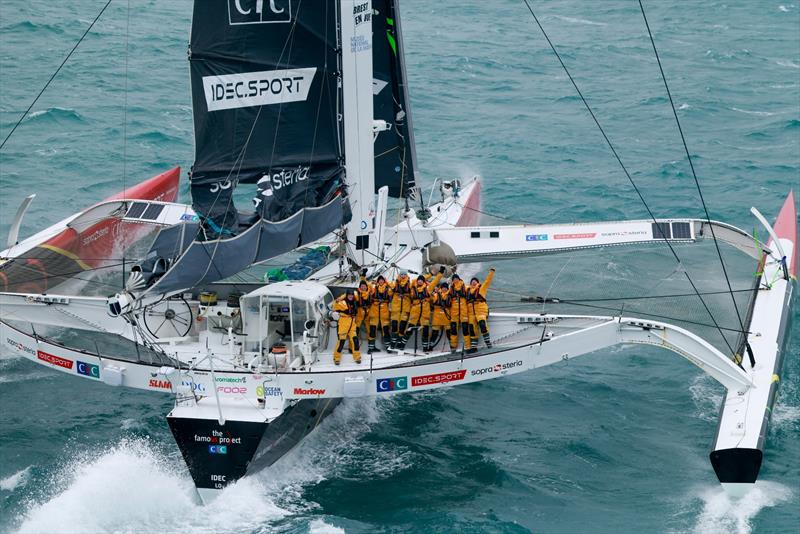 Arrival of Alexia Barrier and his crew of The Famous Project CIC Dee Caffari, Annemieke Bes, Deborah Blair, Molly LaPointe, Támara Echegoyen, Stacey Jackson and Rebecca Gmür Hornell - aboard Maxi Trimaran IDEC Sport off Ouessant, after Jules Verne Trophy - photo © Lloyd / Jmliot Images / CIC