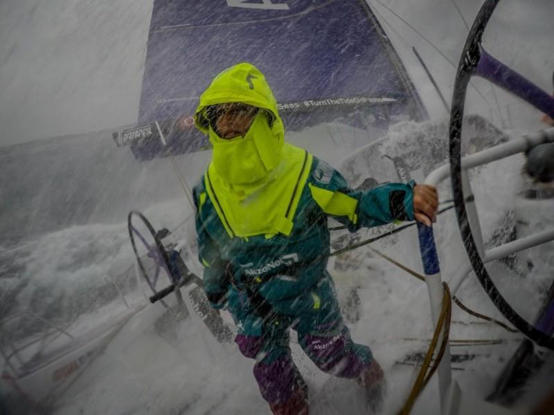 Martine Grael (BRA) turns her back on the stinging sea spray during team AkzoNobel's record setting 24-hour run on Leg 9 of the Volvo Ocean Race - photo © Konrad Frost / Volvo Ocean Race