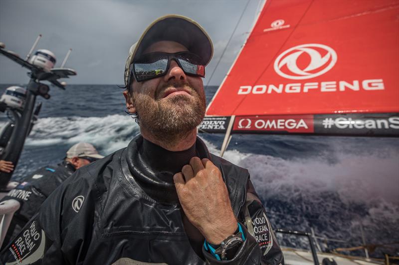 Leg 8 from Itajai to Newport, day 10 on board Dongfeng. 01 May, . Daryl Wislang opens his wet weather gear. - photo © Jeremie Lecaudey / Volvo Ocean Race