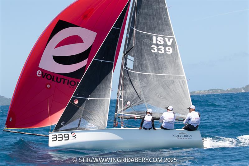 St. Croix native, Tim Pitts, helms his VX One in today's abbreviated VX One Round the Rocks Race - photo © Ingrid Abery / www.ingridabery.com