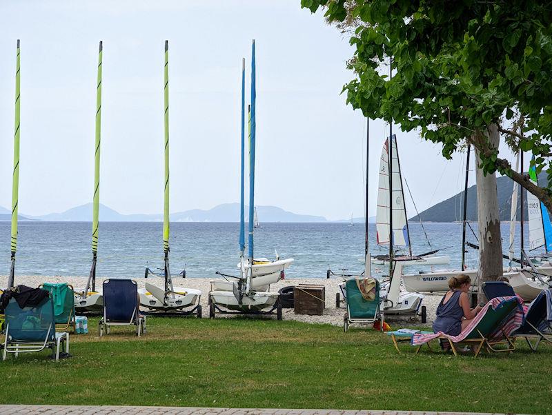 The view from the Kavadias bar, over the Wildwind dinghy park and into the bay photo copyright Mark Jardine taken at  and featuring the  class