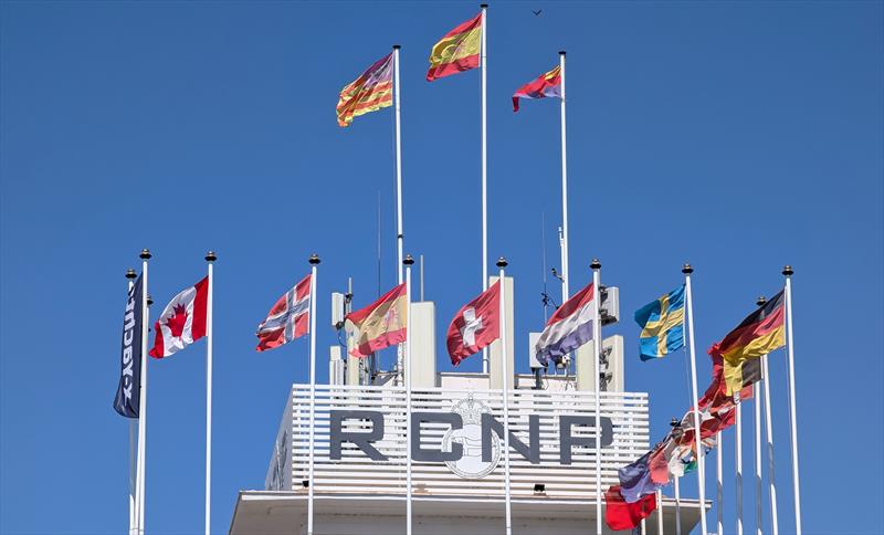 National flags of the competing yachts flying proudly above the Real Club Náutico de Palma at the inaugural X-Yachts Spanish Gold Cup - photo © Mark Jardine